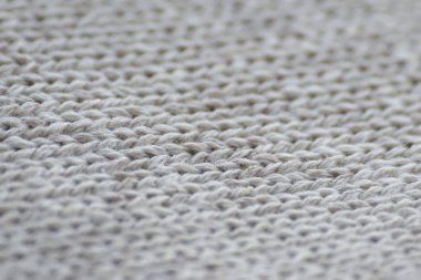 Gri kumaş giyim doku kapatın. Arka plan bulanıklık.