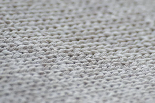 Gri kumaş giyim doku kapatın. Arka plan bulanıklık.