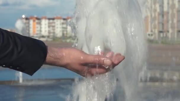Man Wets His Hand Fountain Hand Close — Stock Video