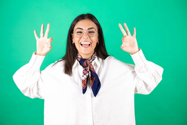 Young Beautiful Business Woman Isolated Green Background Doing Sign Fingers — Stock Photo, Image