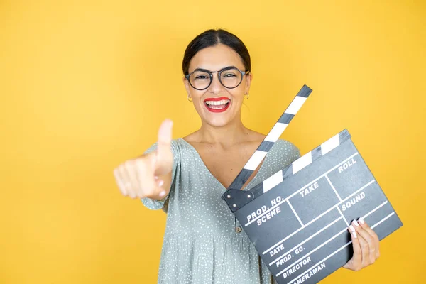 Young Beautiful Woman Wearing Glasses Standing Isolated Yellow Background Holding — Stock Photo, Image