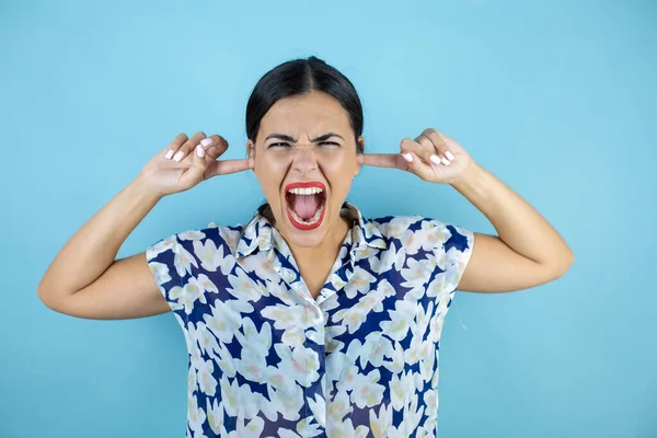 stock image Beautiful woman over isolated background covering ears with fingers with annoyed expression for the noise of loud music. Deaf concept.