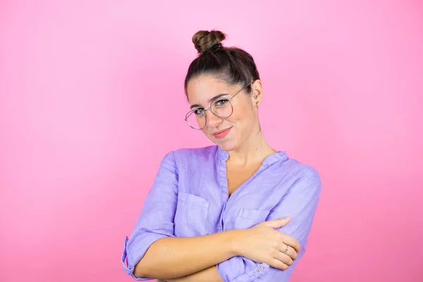 Young Beautiful Woman Wearing Glasses Isolated Pink Background Hugging Oneself — Stock Photo, Image