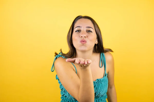 Young Beautiful Woman Isolated Yellow Background Looking Camera Blowing Kiss — Stock Photo, Image