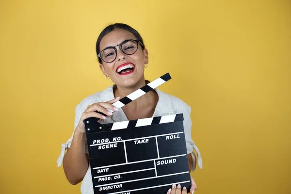 Beautiful Woman Yellow Background Holding Clapperboard Very Happy Having Fun — Stock Photo, Image