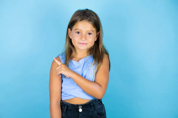 Young Beautiful Child Girl Isolated Blue Background Smiling Pointing Hand — Stock Photo, Image