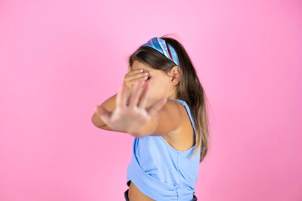 Young Beautiful Child Girl Isolated Pink Background Covering Eyes Hands — Stock Photo, Image