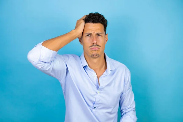 Young Handsome Man Wearing Blue Shirt Isolated Blue Background Putting — Stock Photo, Image