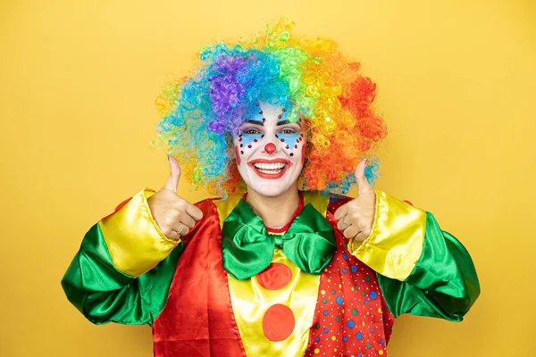 Clown Standing Yellow Insolated Yellow Background Smiling Doing Signal Her — Stock Photo, Image