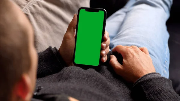 Single Tapping and Holding a Green Screen iPhone
