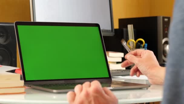 Man Using a Green Screen Laptop — Stock Video