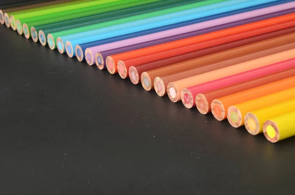 color pencil on dark background, color pencils, back to school material, back to school, colorful pencils lines up, rainbow style