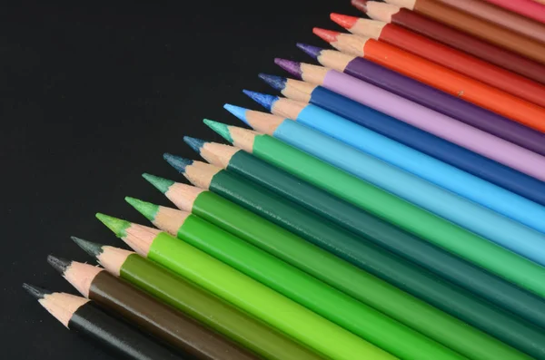 color pencil on dark background, color pencils, back to school material, back to school, colorful pencils lines up, rainbow style