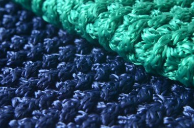 Örgü kumaş dokusu yakın, kumaş rengi örülmüş.
