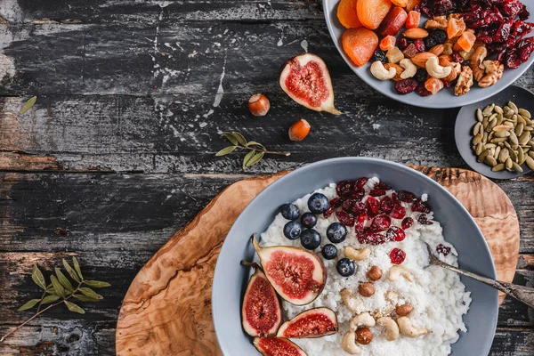 Rice Coconut Porridge Figs Berries Nuts Dried Apricots Coconut Milk — Stock Photo, Image