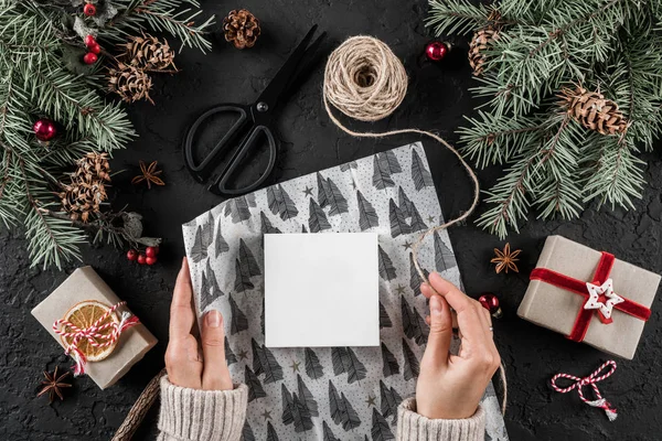 Female Hands Wrapping Christmas Gift Holiday Wrapping Black Background Fir — Stock Photo, Image