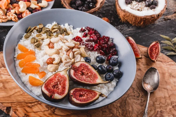 Rice Coconut Porridge Figs Berries Nuts Dried Apricots Coconut Milk — Stock Photo, Image