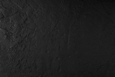 Siyah taş arka plan, gri çimento doku. Üstten görünüm, düz yatıyordu