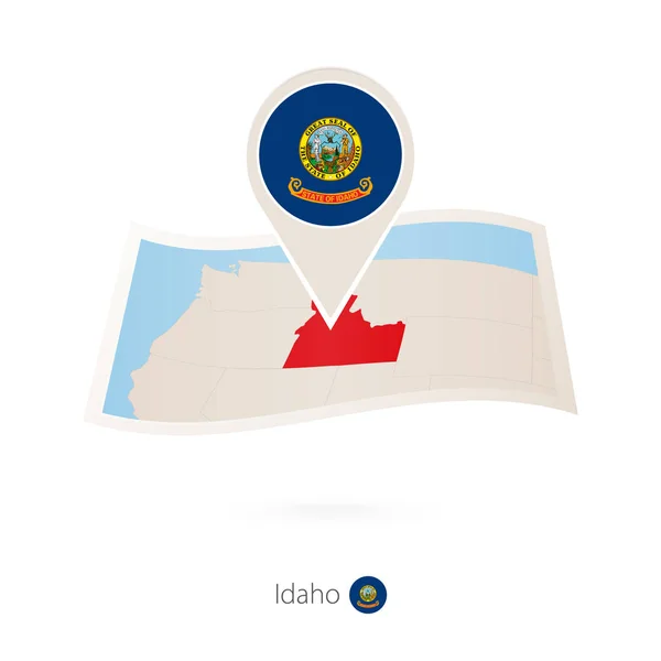 Gevouwen Papieren Kaart Van Idaho Amerikaanse Staat Met Vlag Pin — Stockvector