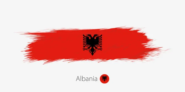 Bandeira Albânia Grunge Pincel Abstrato Sobre Fundo Cinza Ilustração Vetorial — Vetor de Stock