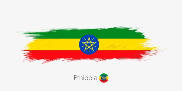 Flagge Äthiopiens Grunge Abstrakter Pinselstrich Auf Grauem Hintergrund Vektorillustration — Stockvektor