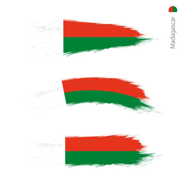 Sada Grunge Texturou Vlajka Madagaskaru Tři Verze Národní Vlajky Stylu — Stockový vektor