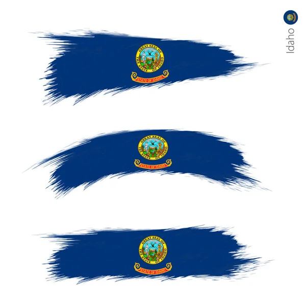 设置3格格纹理标志的我们状态爱达荷州 三个版本的状态旗在笔触画的风格 矢量标志 — 图库矢量图片