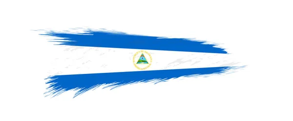 Drapeau du Nicaragua en coup de pinceau . — Image vectorielle