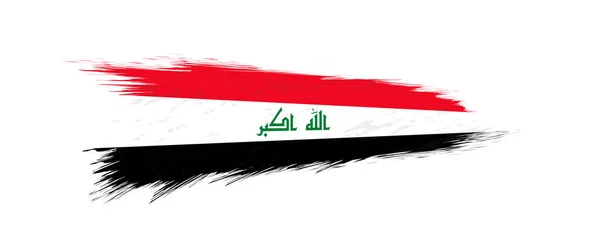 Flag of Iraq in grunge brush stroke. — Stock Vector