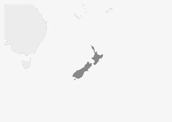 Mapa de Oceanía con el mapa de Nueva Zelanda resaltado — Vector de stock