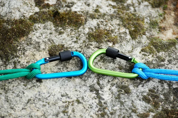 Metal carabine for mountaineering. Photo of colored carabines.  Climbing concept