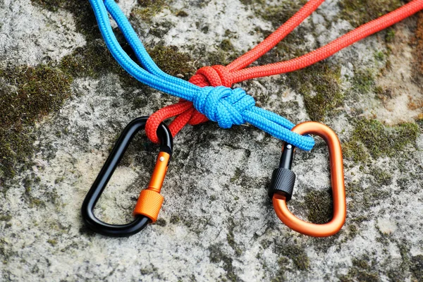 Metal carabine for mountaineering. Photo of colored carabines.  Climbing concept