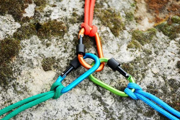 Metal carabine for mountaineering. Photo of colored carabines.  Climbing concept