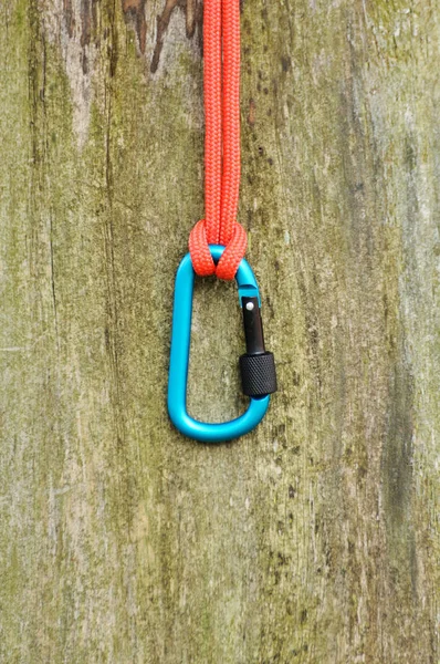 Metal carabine for mountaineering. Photo of colored carabines. Climbing concept