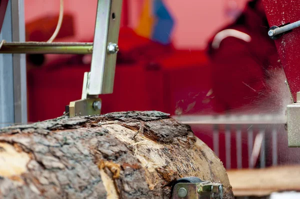 Sawmill. Process of machining logs in equipment sawmill machine — Stock Photo, Image