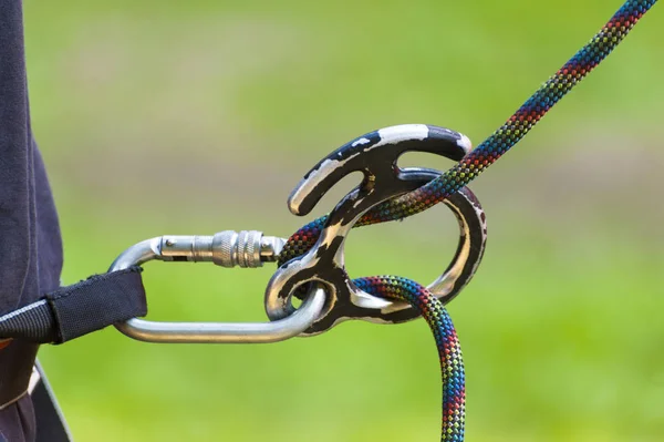 Climbing sports image of a carabiner on a rope — Stock Photo, Image