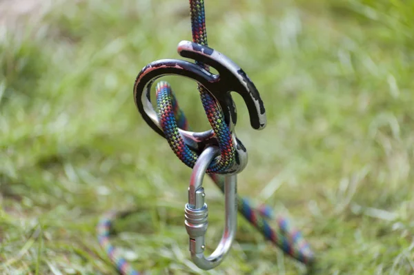 Climbing sports image of a carabiner on a rope — Stock Photo, Image