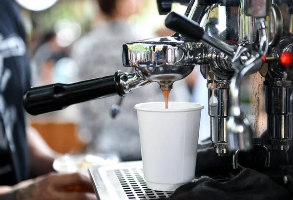 Coffee makers with take away cup.