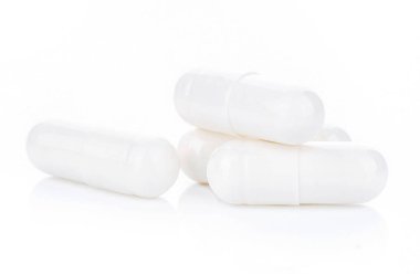 beyaz zemin üzerine beyaz kapsül.