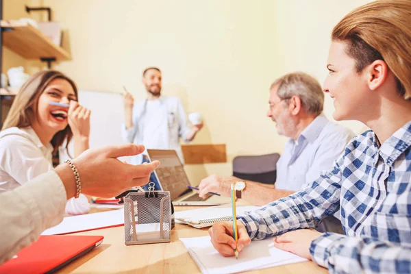 Team job. Photo young businessmans working with new project in office — Stock Photo, Image