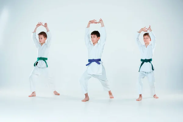 The group of boys fighting at Aikido training in martial arts school. Healthy lifestyle and sports concept — Stock Photo, Image