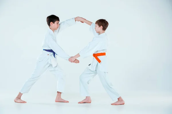 The two boys fighting at Aikido training in martial arts school. Healthy lifestyle and sports concept — Stock Photo, Image