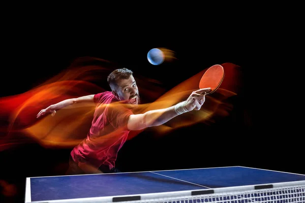 The table tennis player serving