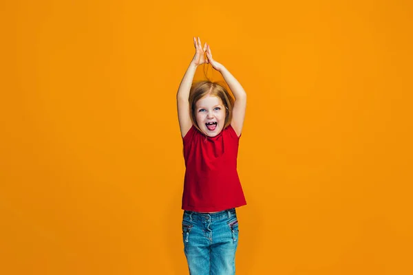 Happy success teen girl celebrating being a winner. Dynamic energetic image of female model — Stock Photo, Image