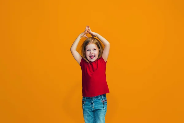 Happy success teen girl celebrating being a winner. Dynamic energetic image of female model — Stock Photo, Image