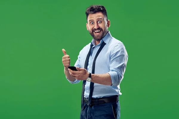 Guapo hombre de negocios con teléfono móvil — Foto de Stock