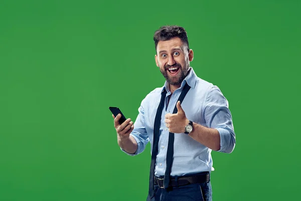 Homem de negócios bonito com telefone móvel — Fotografia de Stock