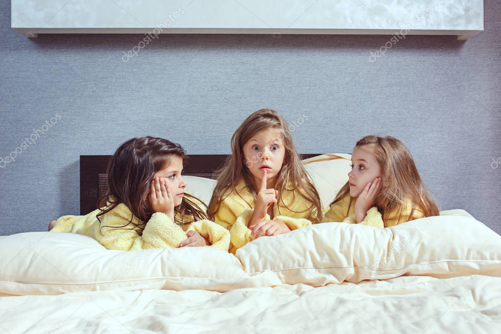 The group of girlfriends taking goog time on bed