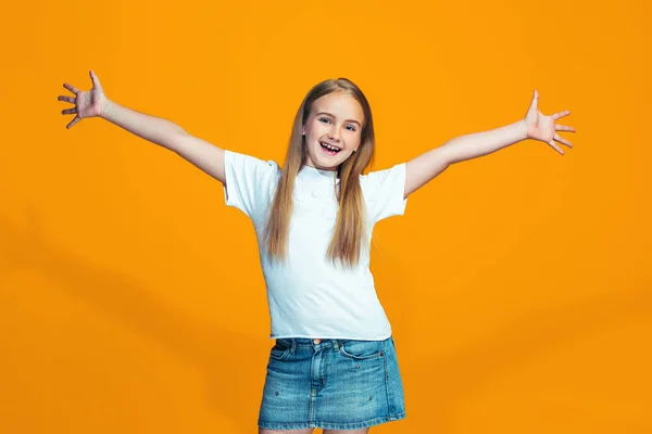 Happy success teen girl celebrating being a winner. Dynamic energetic image of female model — Stock Photo, Image