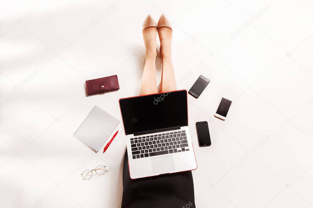 Fashion blogger writing on laptop computer